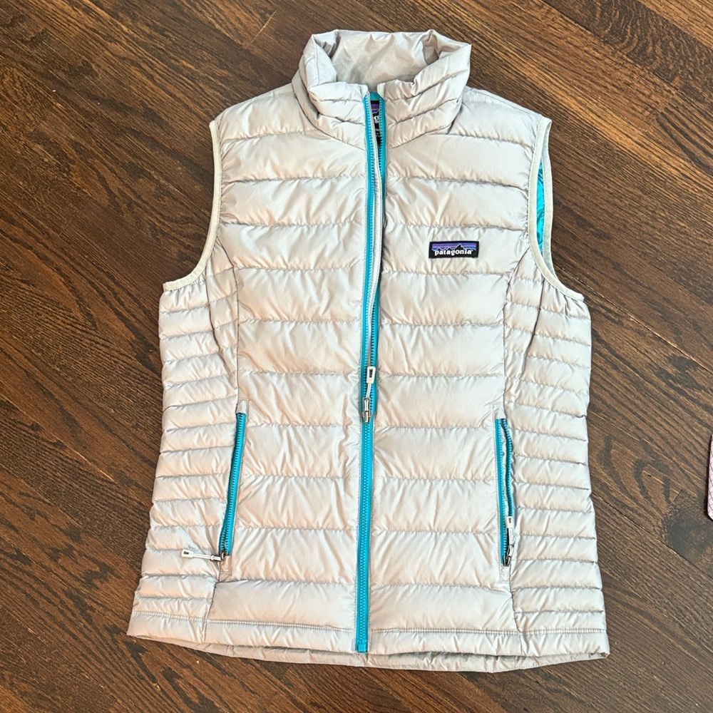 Patagonia Light Gray goose down Vest with Blue Zipper